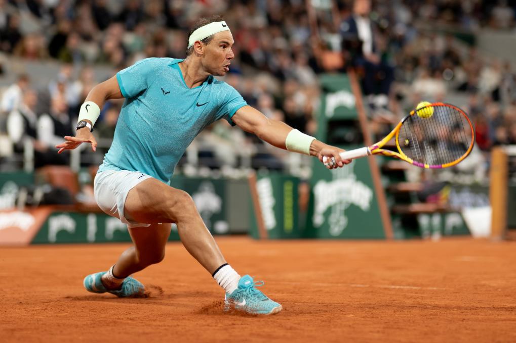 PHOTO shows Rafael Nadal of Spain hits a return to Alexander Zverev of Germany during the men's singles 1st round at the French Open on May 27, 2024 — Xinhua