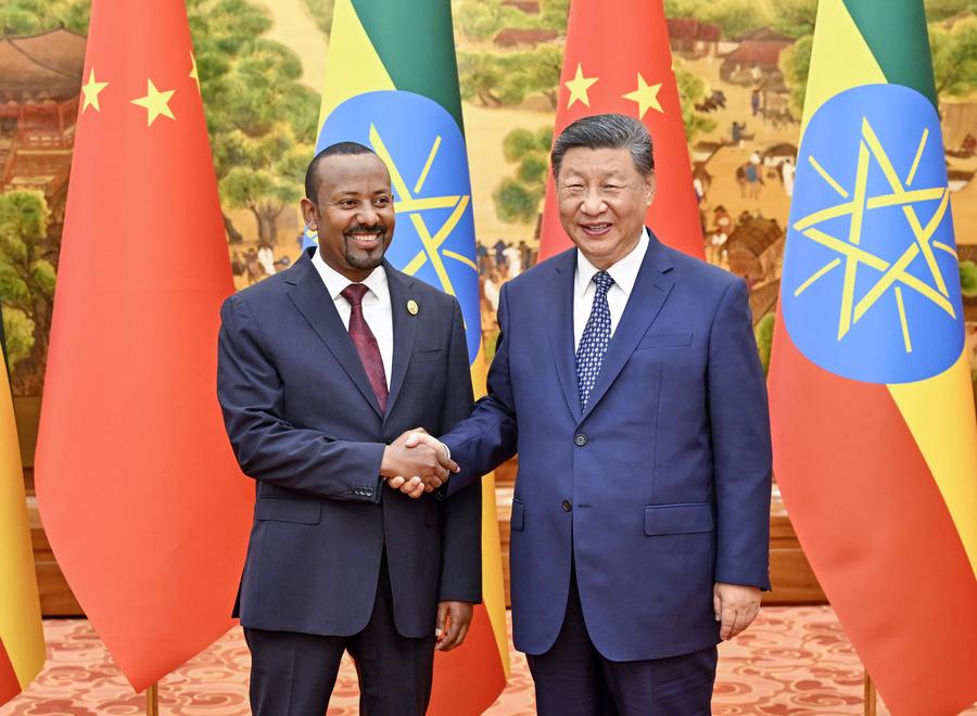 Chinese President Xi Jinping meets with Ethiopian Prime Minister Abiy Ahmed, who is in Beijing for the 2024 Summit of the Forum on China-Africa Cooperation (FOCAC), at the Great Hall of the People in Beijing, capital of China, Sept. 4, 2024. (Xinhua/Yin Bogu)